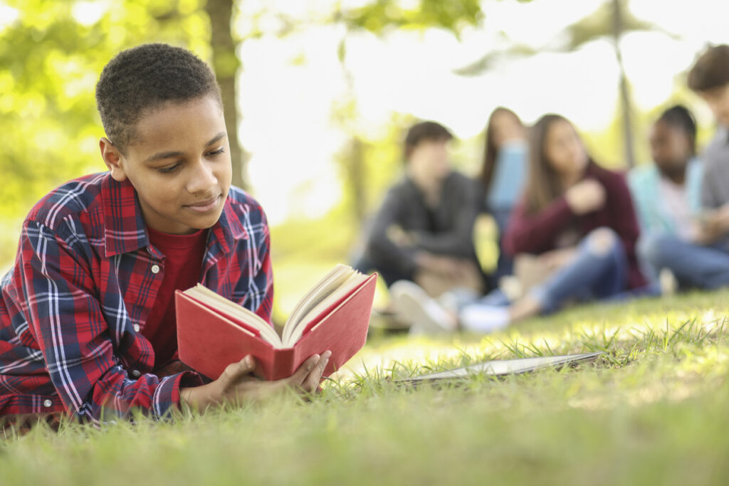 boy reading older